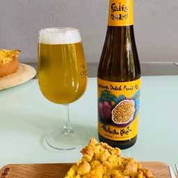 Passion Fruit beer bottle and glass with cake