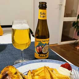 Passion Fruit beer bottle and glass with fries