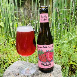 Strawberry beer bottle and glass with bamboo