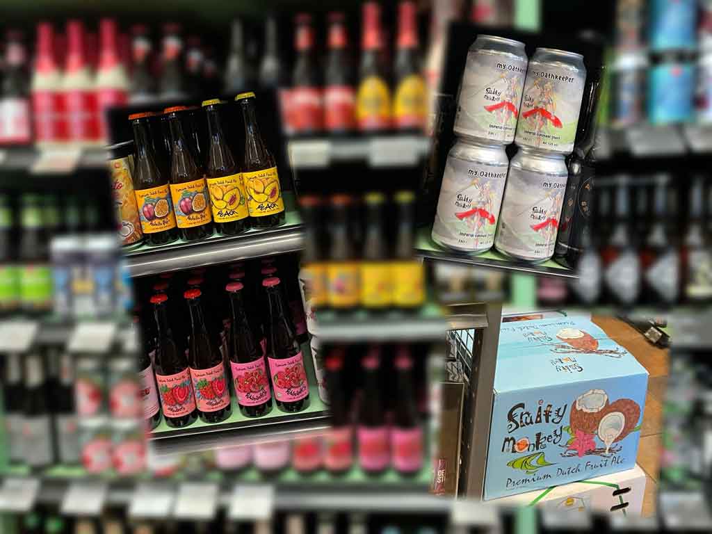 Summer flavour fruit-blend beer collage of bottles, cans and boxes in front of a liquor store's blurred shelves